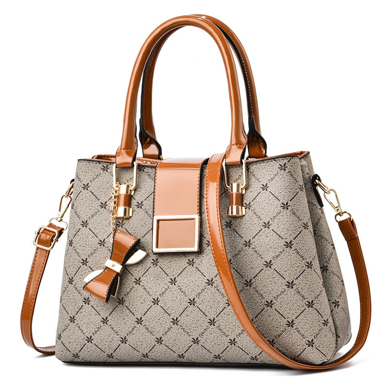 Bolsa feminina de ombro e mão  conjunto de luxo.