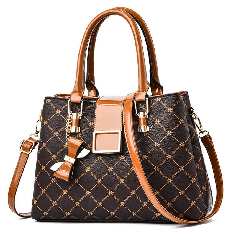 Bolsa feminina de ombro e mão  conjunto de luxo.