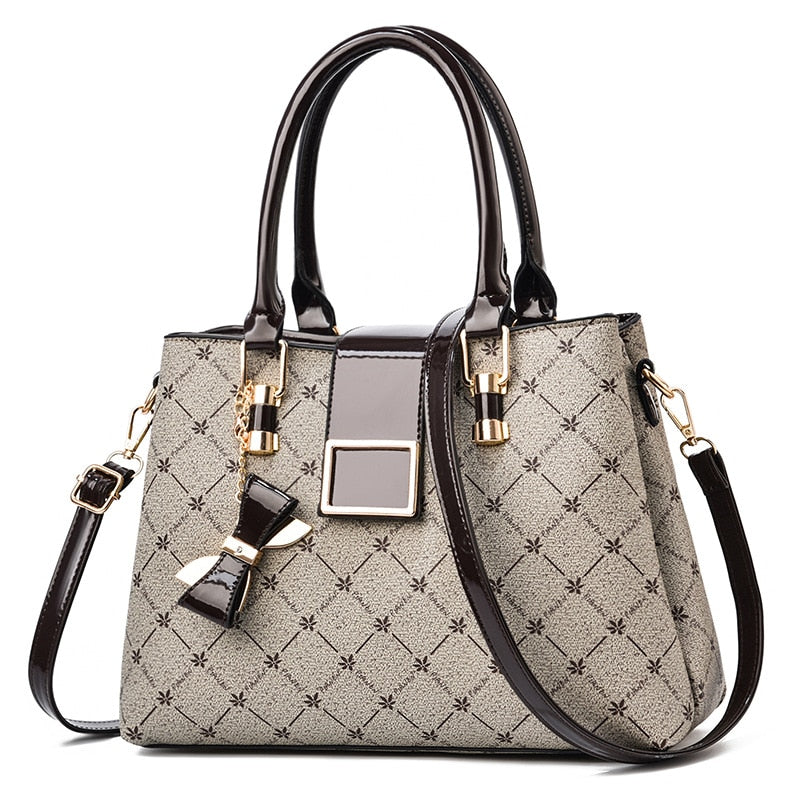 Bolsa feminina de ombro e mão  conjunto de luxo.