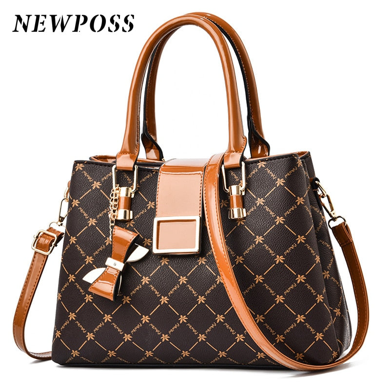 Bolsa feminina de ombro e mão  conjunto de luxo.